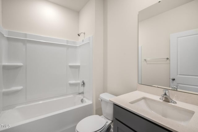 full bathroom with toilet, vanity, and shower / bathtub combination