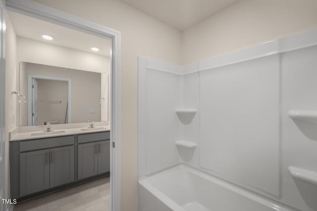 bathroom featuring vanity and bathtub / shower combination