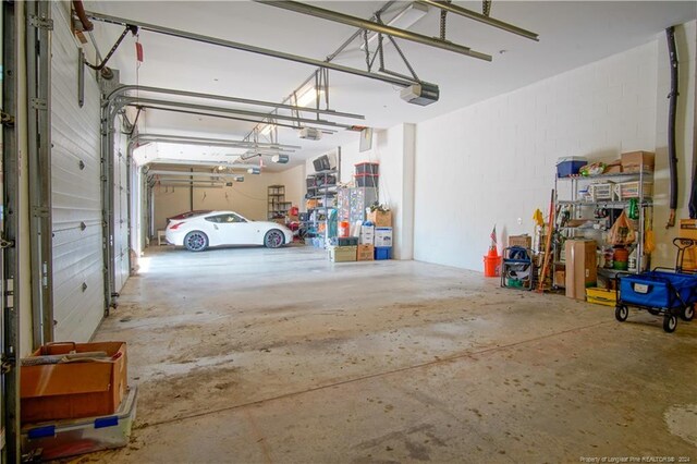 garage featuring a garage door opener