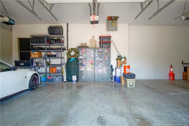 garage featuring a garage door opener