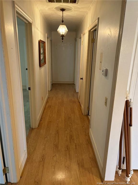 hallway featuring light hardwood / wood-style floors