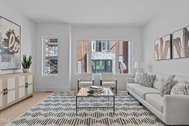 living room featuring light wood-type flooring