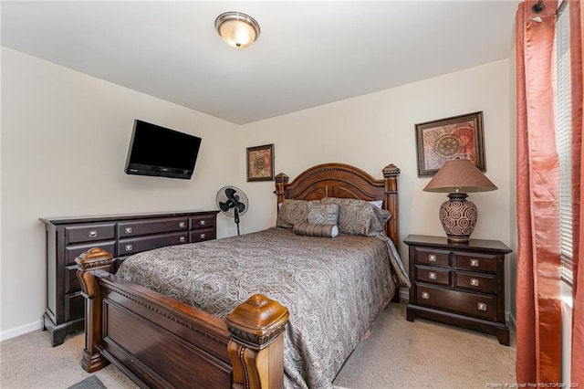 bedroom with light colored carpet