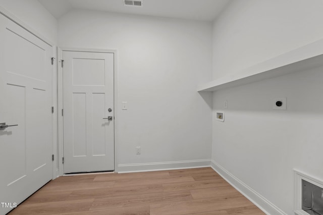 laundry area with hookup for a washing machine, light hardwood / wood-style floors, and electric dryer hookup