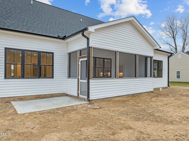 back of property featuring a patio area