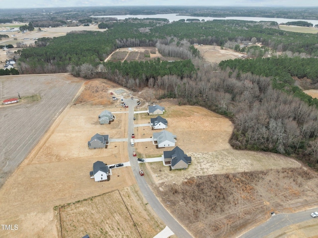 drone / aerial view with a rural view and a water view