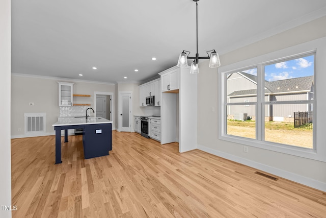 kitchen with visible vents, appliances with stainless steel finishes, open shelves, tasteful backsplash, and crown molding