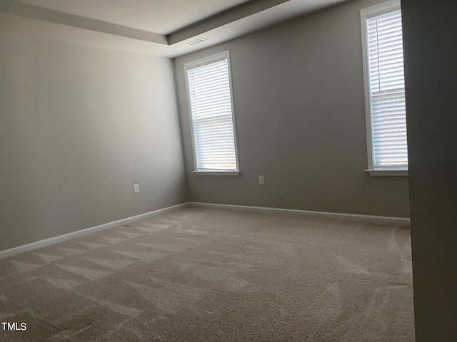 unfurnished room with carpet flooring