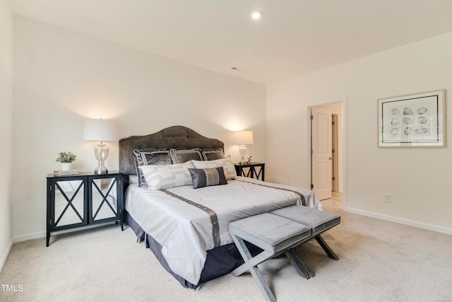 bedroom featuring light carpet, recessed lighting, and baseboards