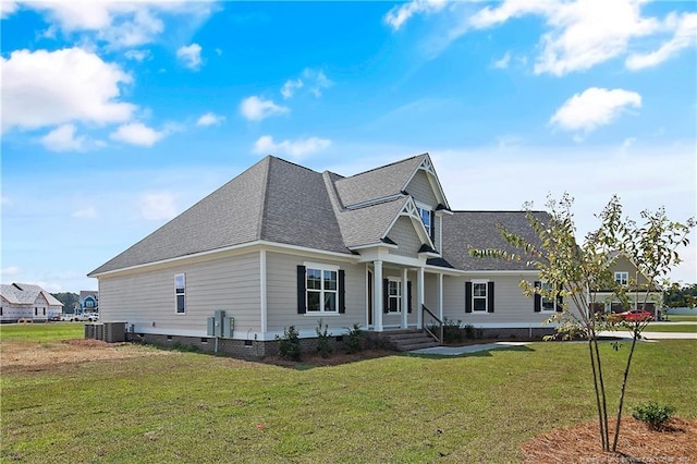 exterior space with central AC, a porch, and a front lawn