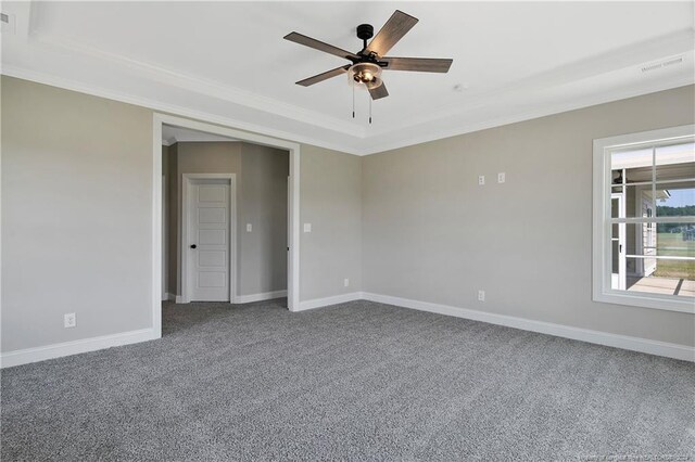 unfurnished bedroom with carpet flooring, ceiling fan, and ornamental molding