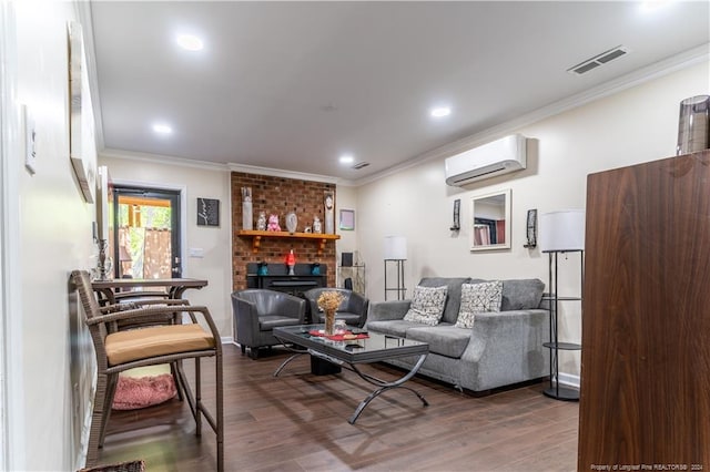 living room featuring ornamental molding, dark hardwood / wood-style floors, an AC wall unit, and a brick fireplace