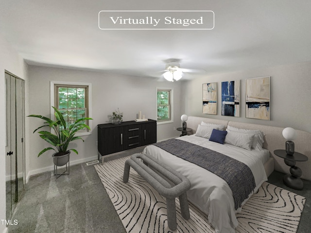 carpeted bedroom featuring ceiling fan