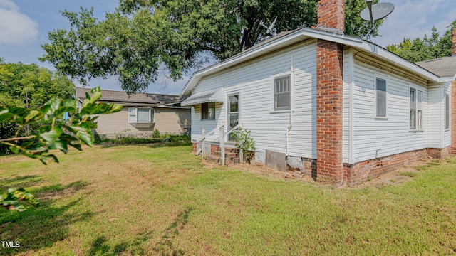 exterior space with a lawn