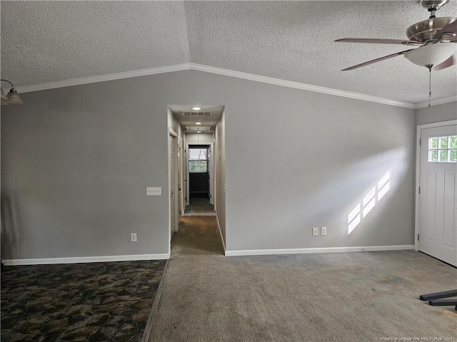 unfurnished room featuring ceiling fan, carpet floors, a textured ceiling, and vaulted ceiling