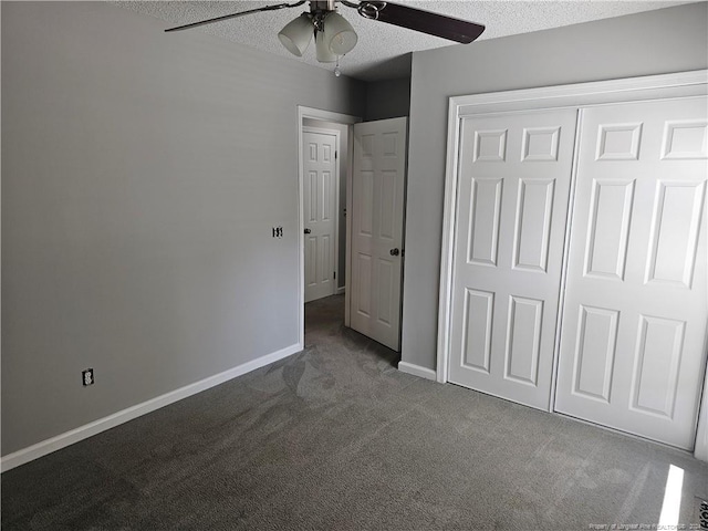 unfurnished bedroom featuring carpet flooring, a closet, ceiling fan, and a textured ceiling