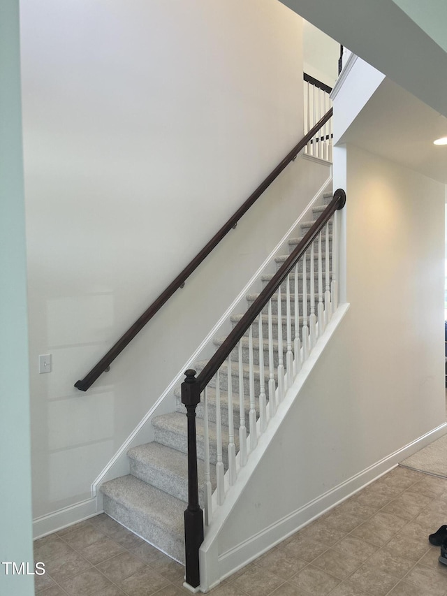 1565 Sage Treee Dr, Zebulon, NC 27597 - stairs with baseboards