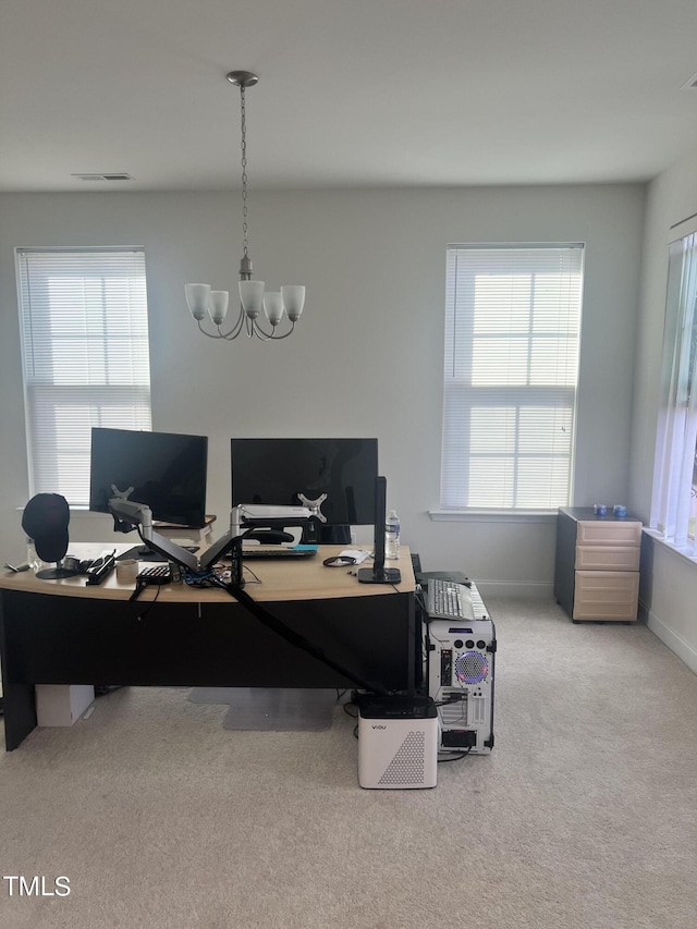 1565 Sage Treee Dr, Zebulon, NC 27597 - office area with a chandelier, visible vents, a healthy amount of sunlight, and carpet