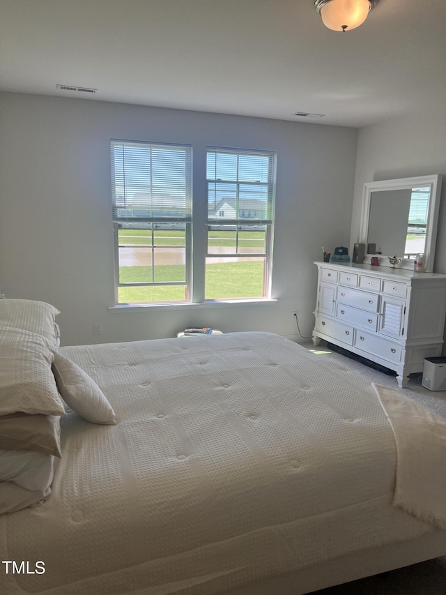 1565 Sage Treee Dr, Zebulon, NC 27597 - bedroom featuring visible vents and carpet flooring