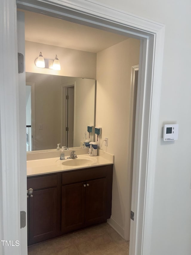 1565 Sage Treee Dr, Zebulon, NC 27597 - bathroom featuring tile patterned flooring and vanity