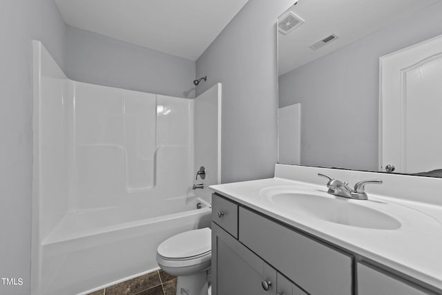 full bathroom with tile patterned flooring, vanity, toilet, and shower / washtub combination