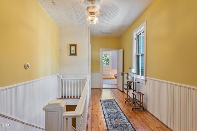 214 College St, Oxford, NC 27565 - hall featuring hardwood / wood-style floors, a wainscoted wall, and visible vents