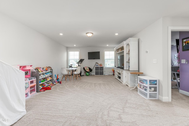 playroom featuring recessed lighting, light colored carpet, and baseboards