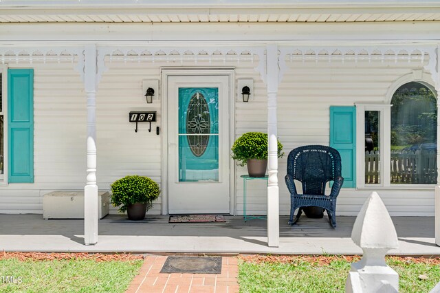 property entrance with a porch