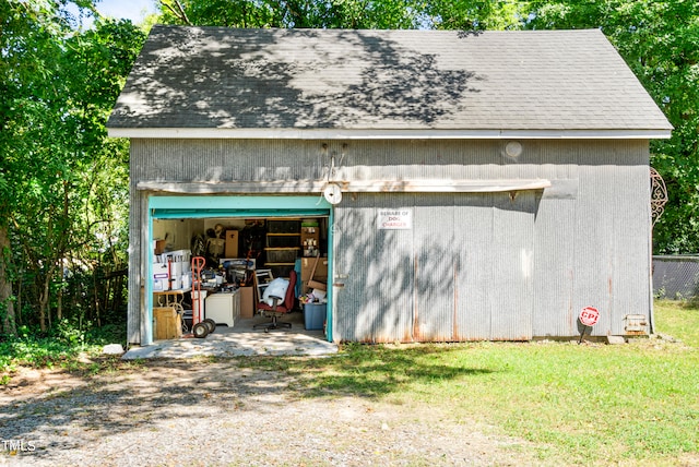 garage with a yard