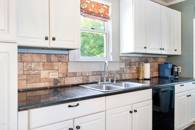 kitchen featuring black dishwasher, sink, and white cabinetry