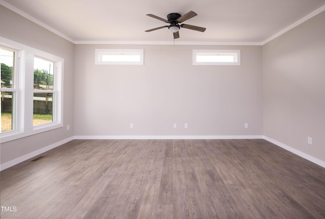 spare room with crown molding, ceiling fan, and hardwood / wood-style floors