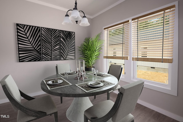 dining area with crown molding, plenty of natural light, a notable chandelier, and hardwood / wood-style floors