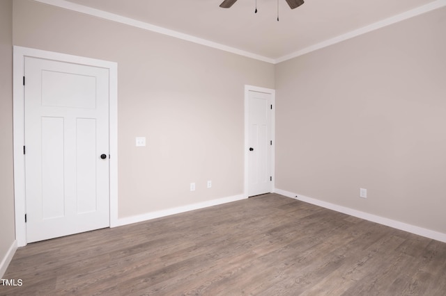 unfurnished room featuring crown molding, ceiling fan, and hardwood / wood-style floors