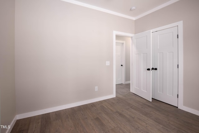 empty room featuring dark wood-type flooring