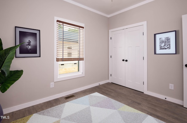 bedroom featuring a closet and wood-type flooring