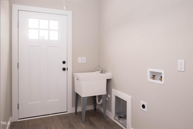 laundry area with dark hardwood / wood-style flooring, hookup for a washing machine, and hookup for an electric dryer