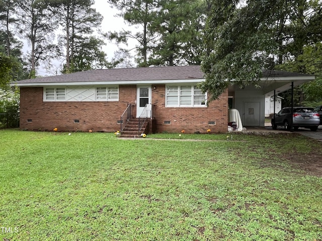 ranch-style house with a front yard and a carport