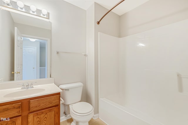 full bathroom featuring vanity, toilet, tile patterned floors, and shower / washtub combination