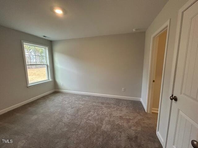 view of carpeted spare room