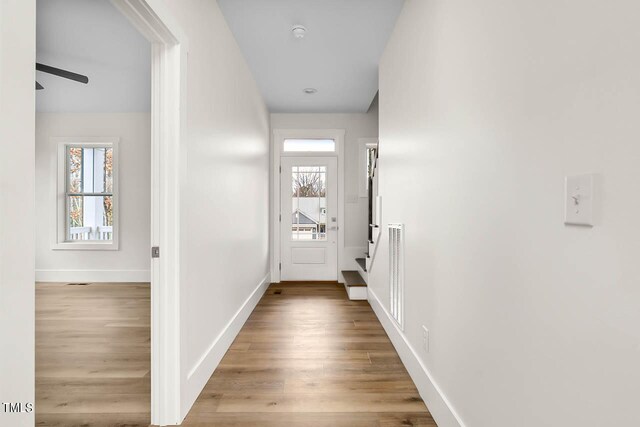 corridor featuring light wood-type flooring