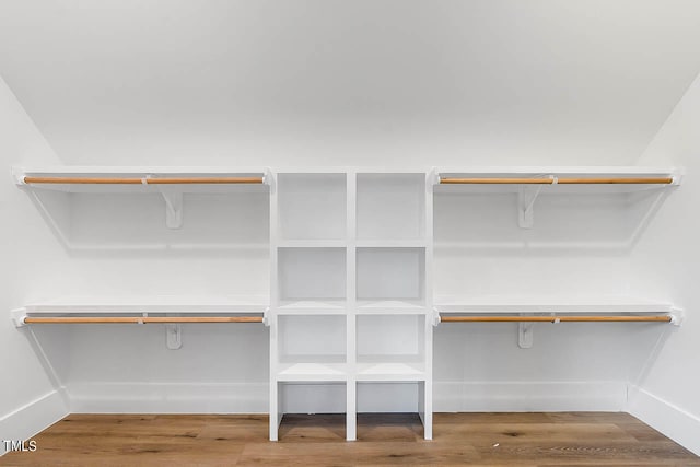 walk in closet featuring hardwood / wood-style floors