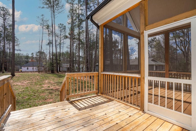 wooden terrace with a sunroom