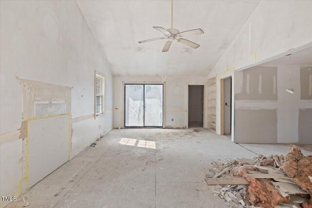 interior space featuring vaulted ceiling and ceiling fan