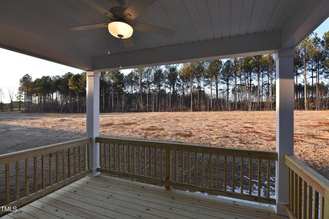 wooden deck with ceiling fan