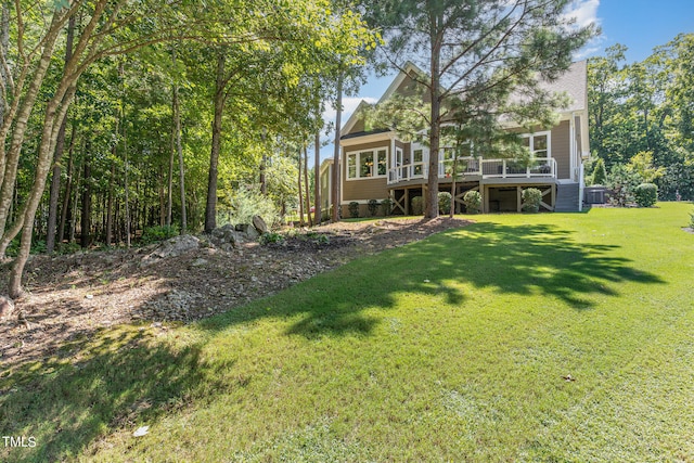 view of yard featuring a deck