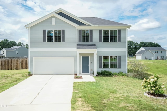 view of front facade featuring a garage and a front yard