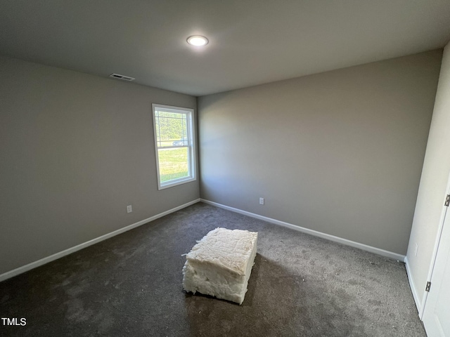 98 Lotus Ave, Smithfield, NC 27577 - carpeted empty room featuring baseboards and visible vents