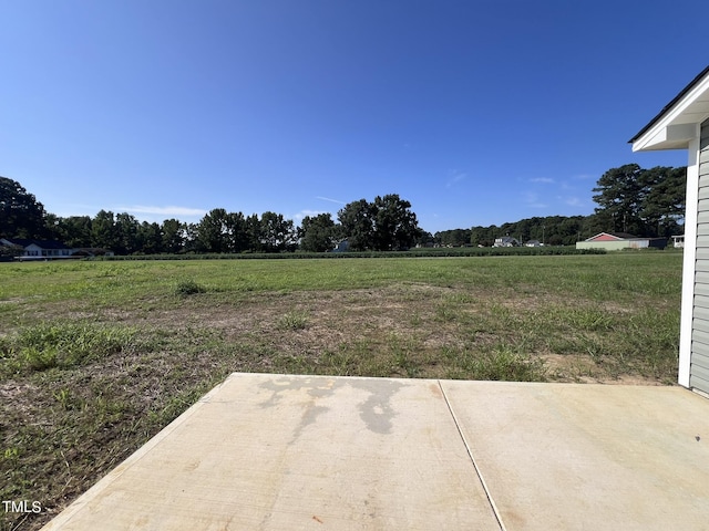 98 Lotus Ave, Smithfield, NC 27577 - view of yard featuring a patio area