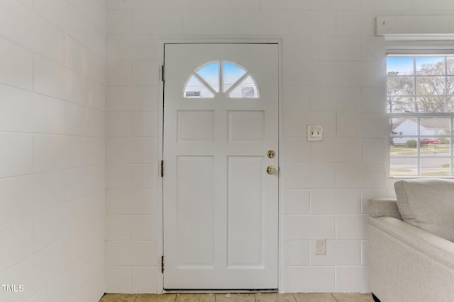 foyer with light tile patterned floors