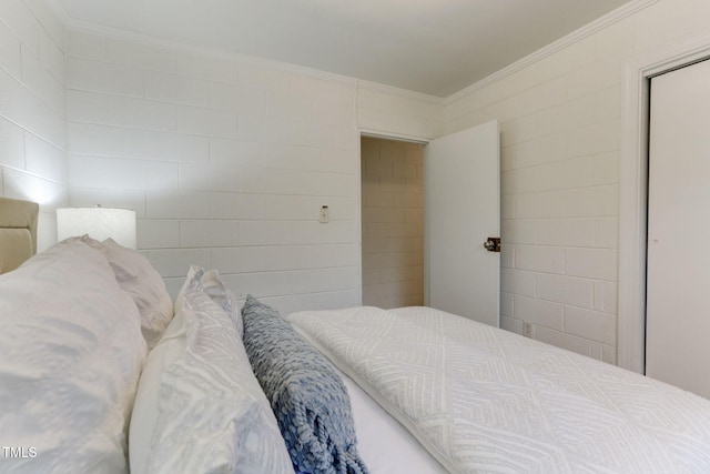 bedroom with crown molding